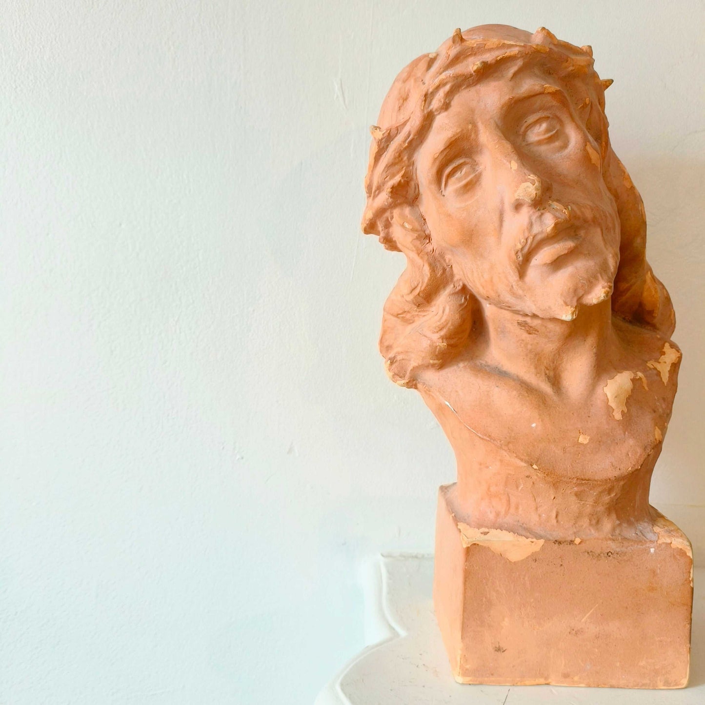 Bust sculpture of Jesus Christ with crown of thorns and expressive upward gaze, early 20th century plaster artwork from France