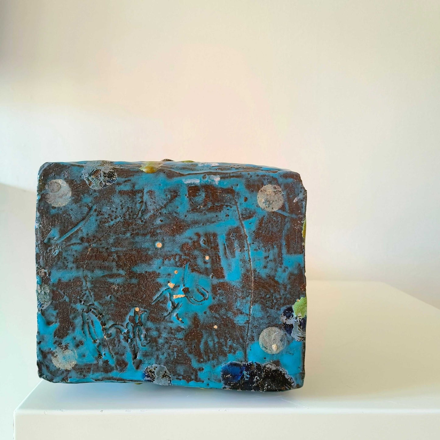 Vintage German studio pottery vase with turquoise blue, indigo, black, and mossy green textured accents