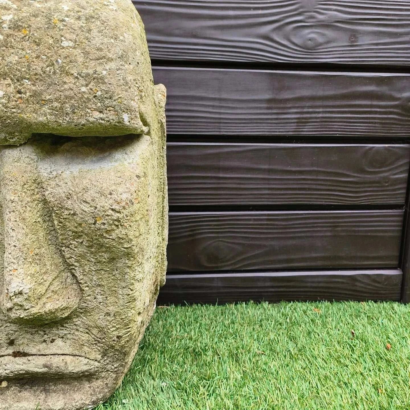 Easter Island Concrete Garden Statue with weathered surface and lichen detailing