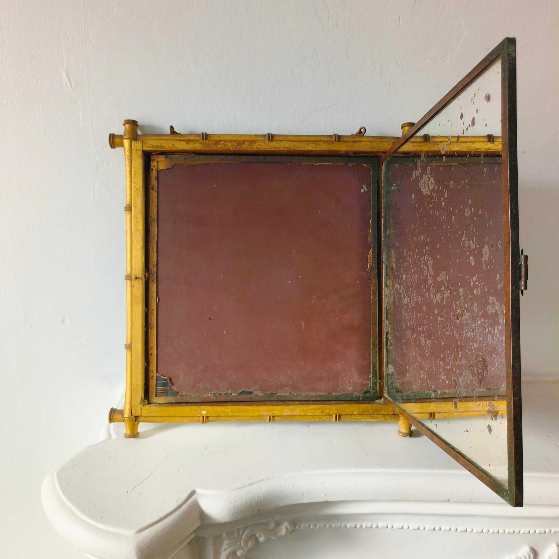 Late 19th-century faux bamboo triptych mirror with Napoleon III design