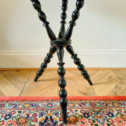 Antique Victorian gypsy table with red velvet octagonal top and ebonized bobbin turned legs