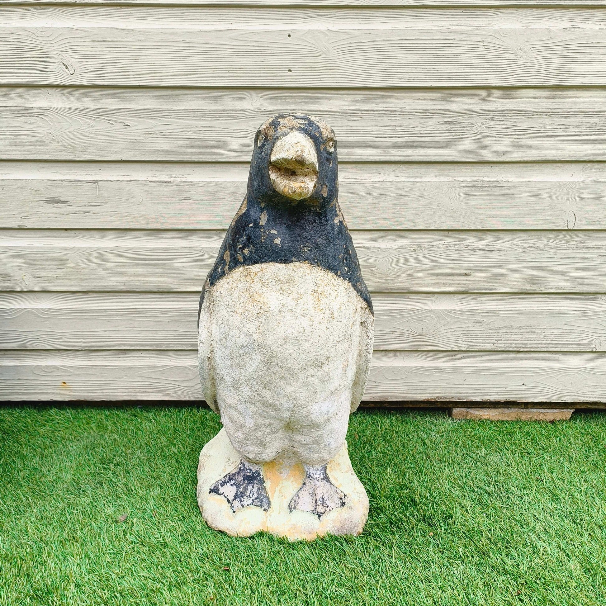 Concrete garden painted penguin with weathered patina and original mid-20th century paint from Portugal