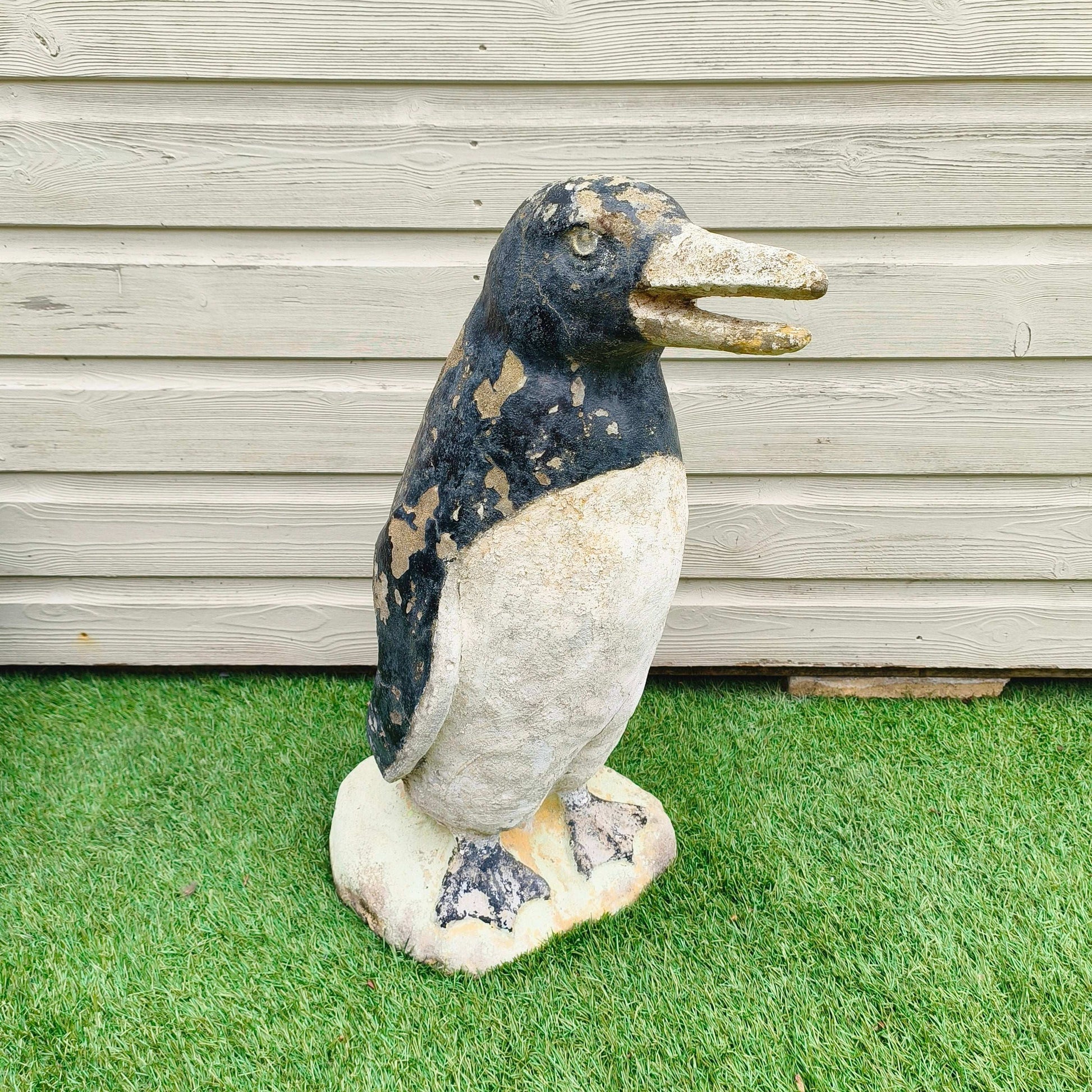 Concrete garden painted penguin with weathered patina and original mid-20th century paint from Portugal