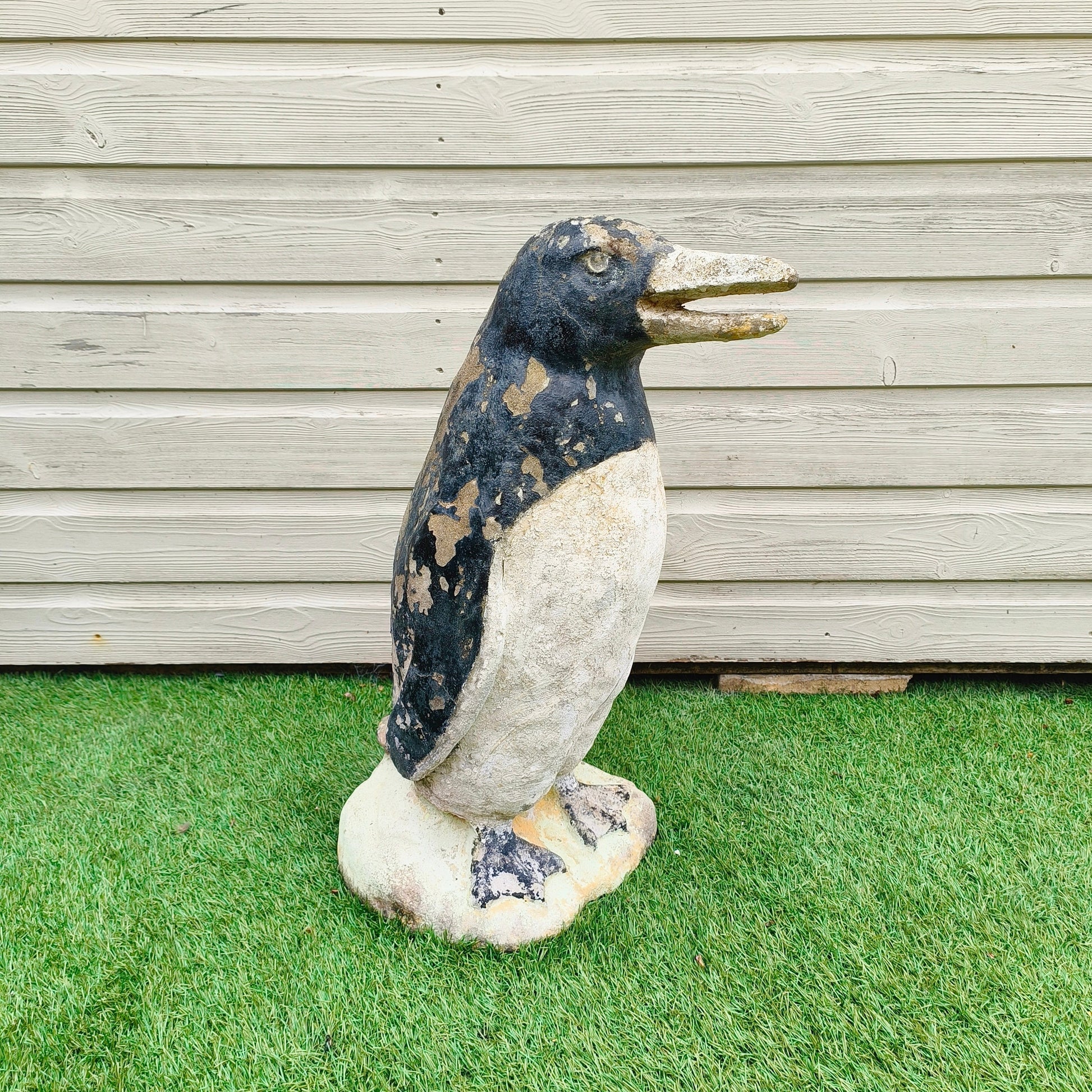 Concrete garden painted penguin with weathered patina and original mid-20th century paint from Portugal