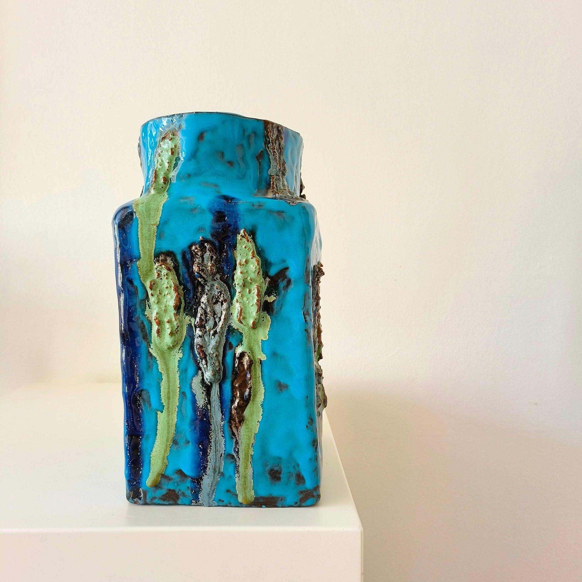 Vintage German studio pottery vase with turquoise blue, indigo, black, and mossy green textured accents