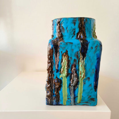 Vintage German studio pottery vase with turquoise blue, indigo, black, and mossy green textured accents