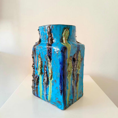 Vintage German studio pottery vase with turquoise blue, indigo, black, and mossy green textured accents