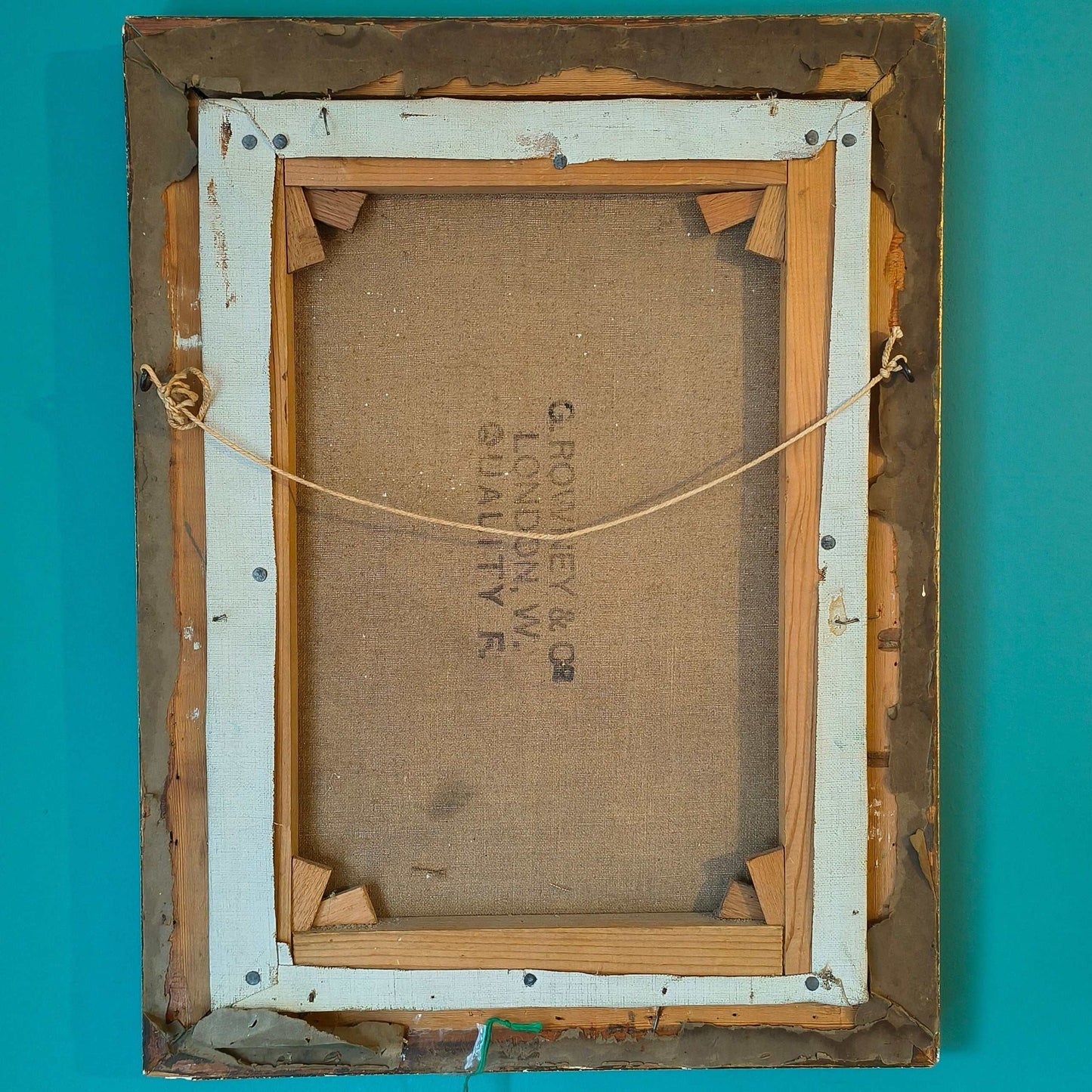 A portrait of a haggard sea captain at the helm, steering a ship