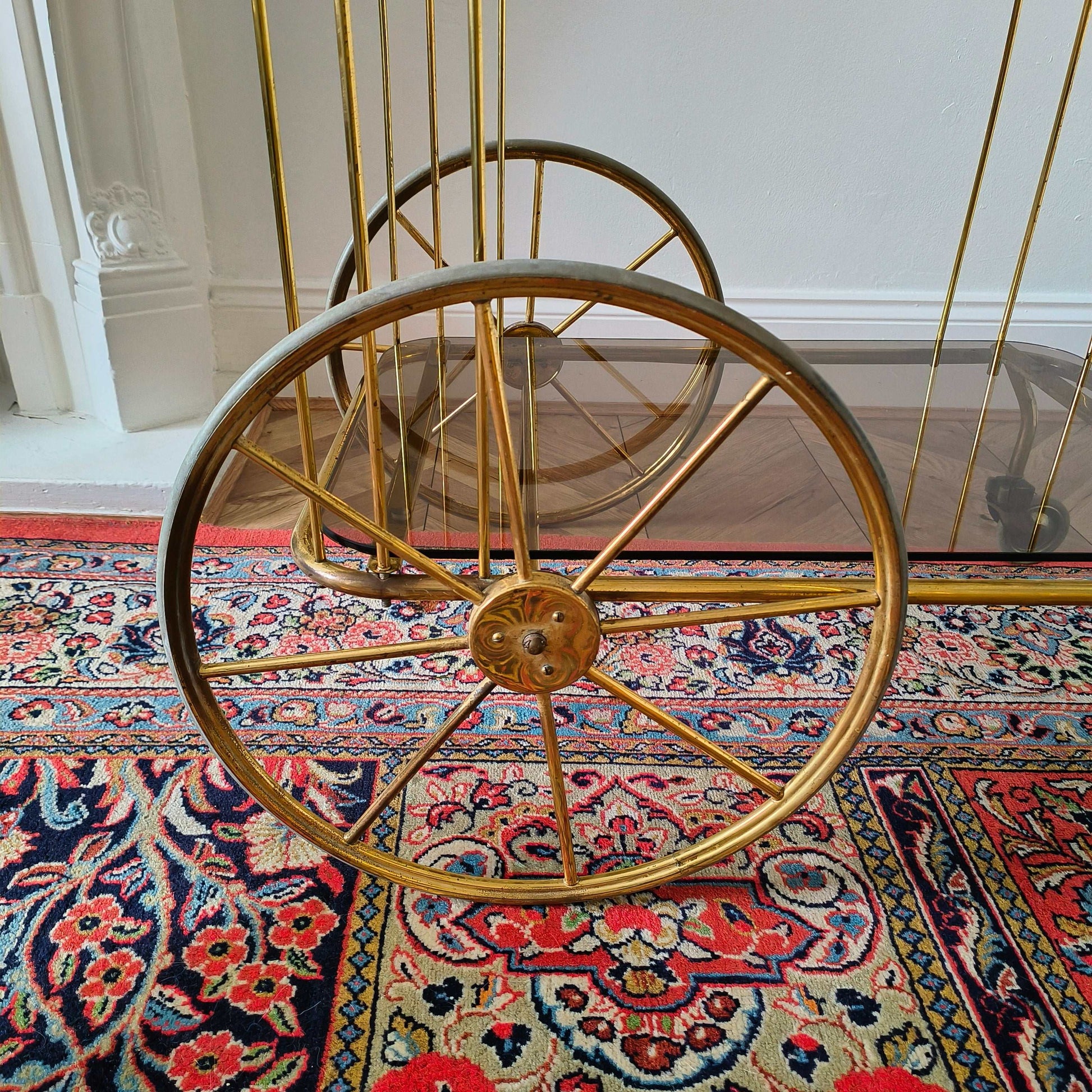 Vintage brass and smoke glass bar cart