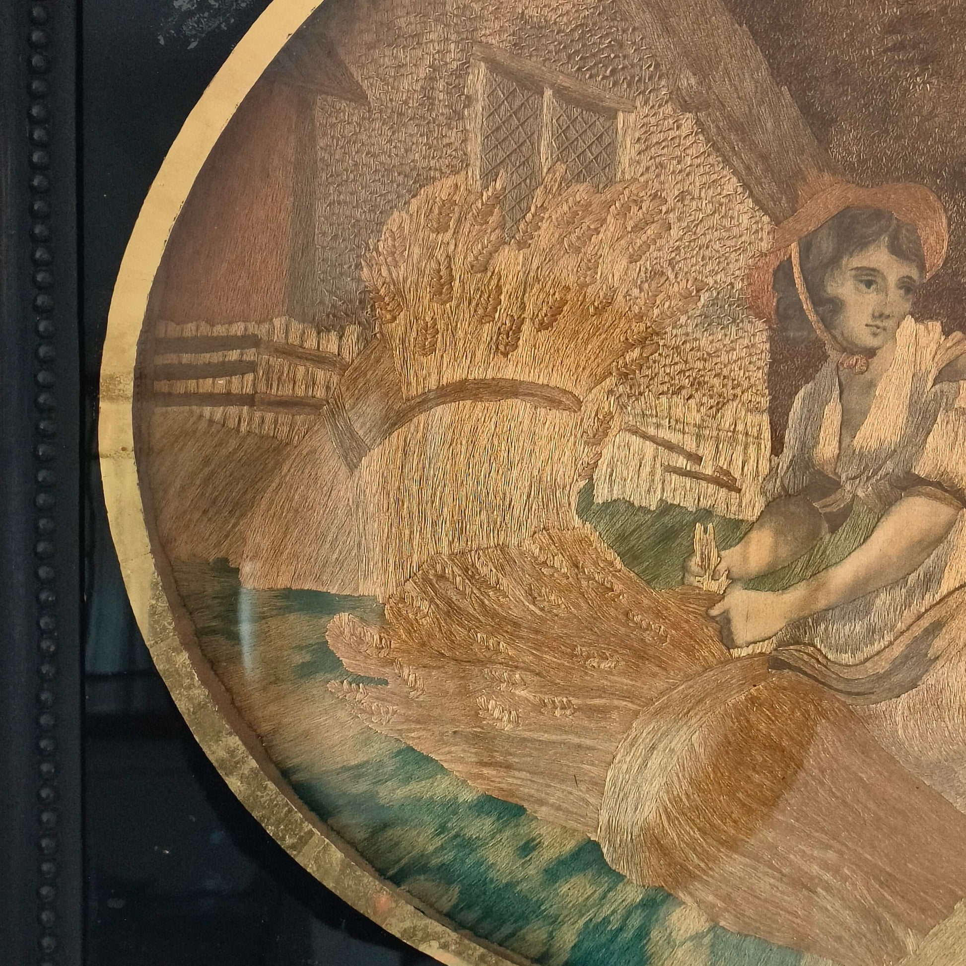 The Artwork is an oval embroidery on fine silk