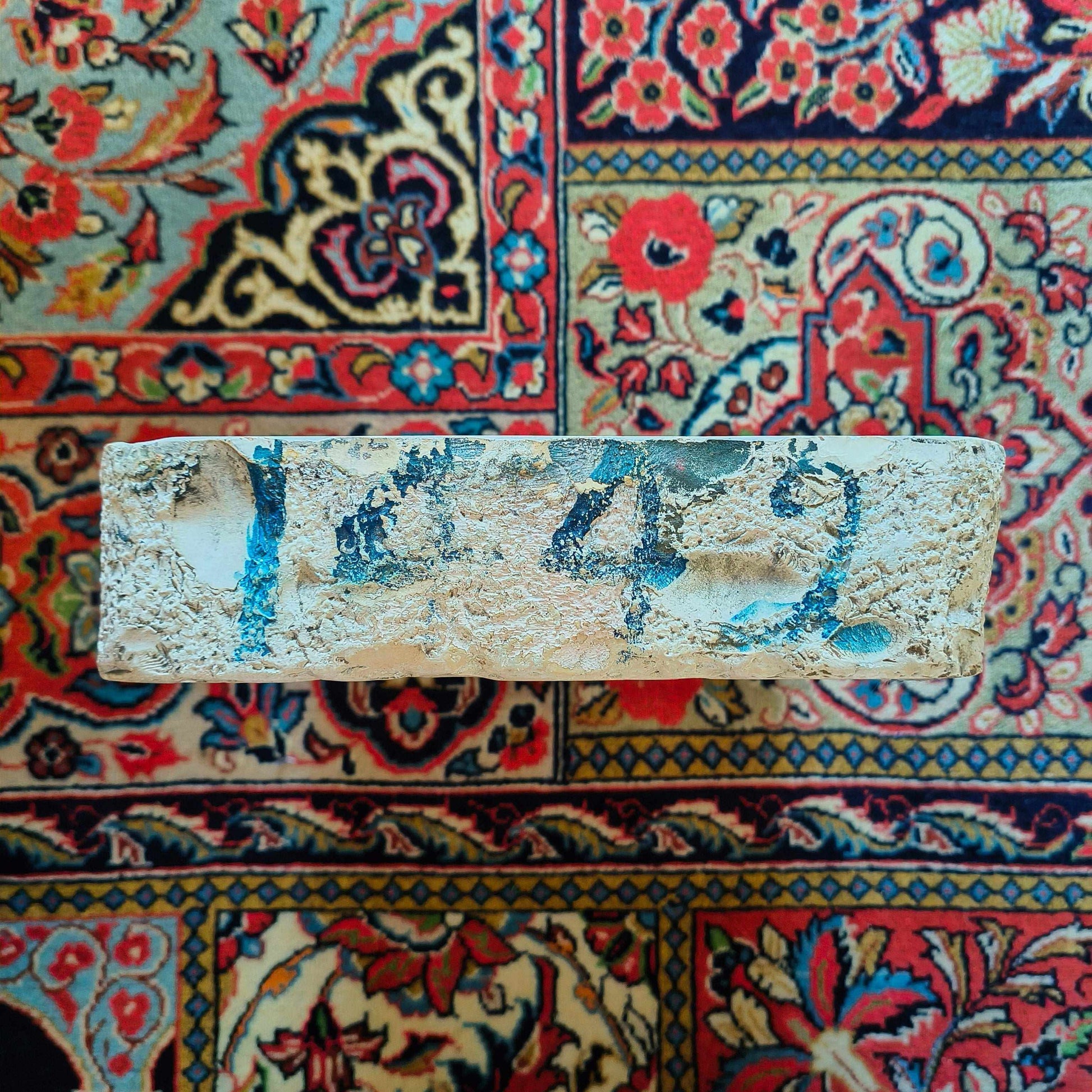 Lithographic limestone printing block featuring hand-drawn stone church tower with weather vane in rural landscape