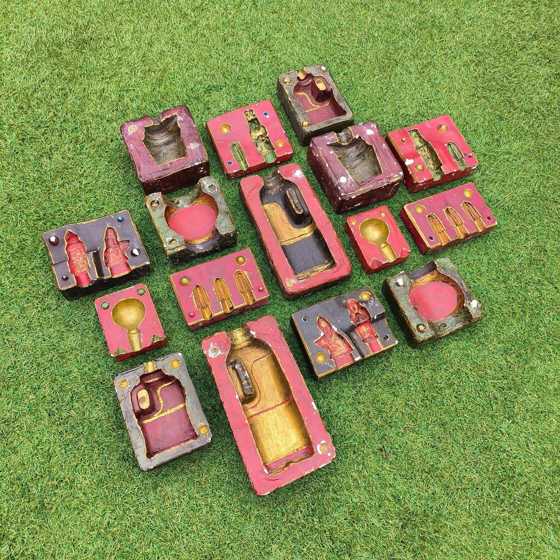 Various decorative plaster moulds from the Cotswolds including bottle and chess piece designs