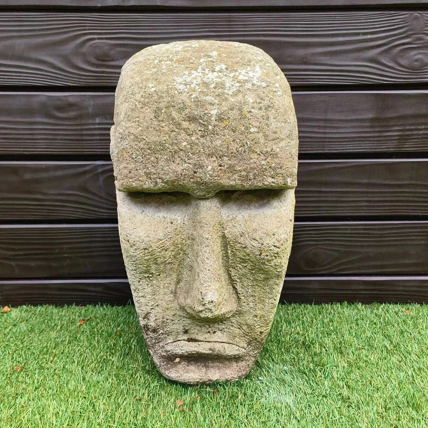 Easter Island Concrete Garden Statue with weathered surface and lichen detailing