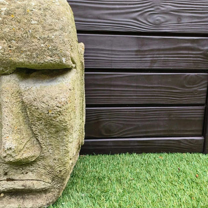 Easter Island Concrete Garden Statue with weathered surface and lichen detailing