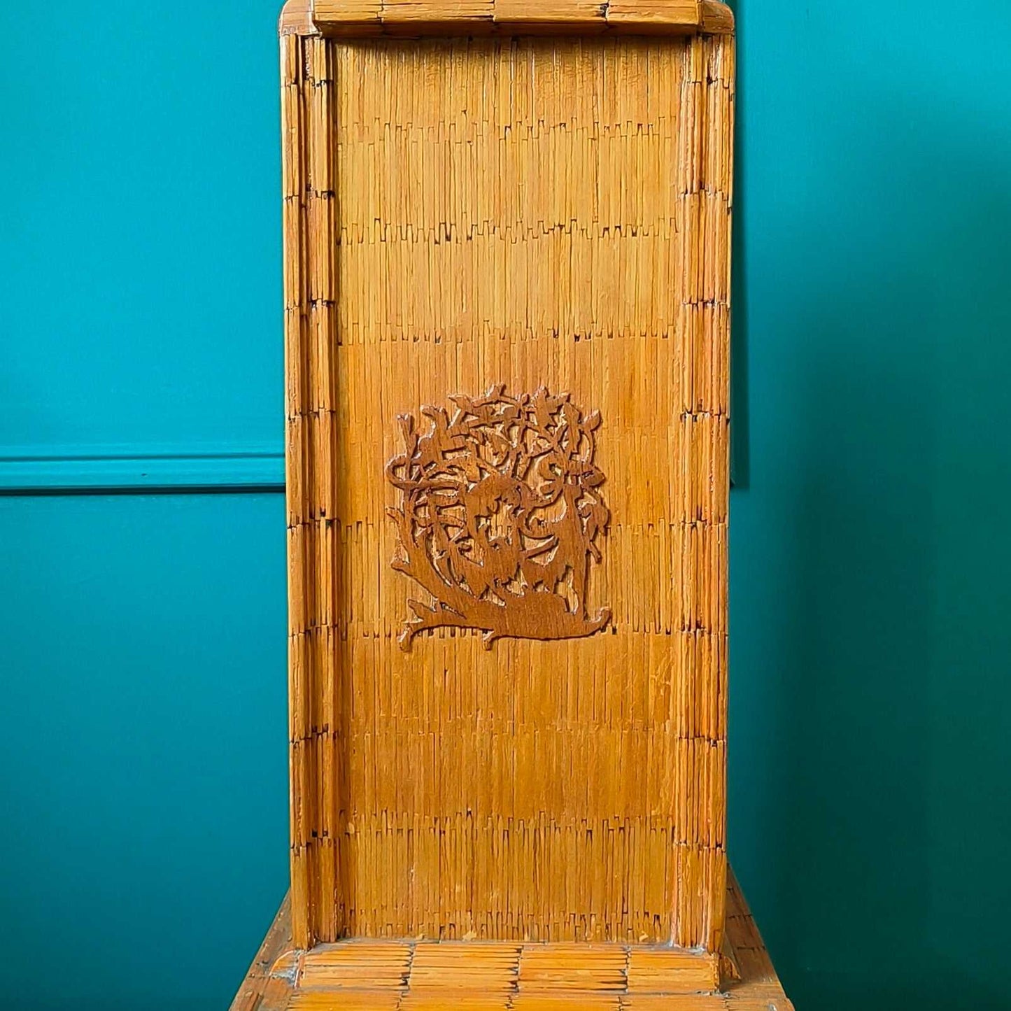 Likely German Mid-century. Constructed from matchsticks with a working clock and a drawer at the base.
Features a decorative horse figure on the very top.
Intricate jail-style folk Art.
