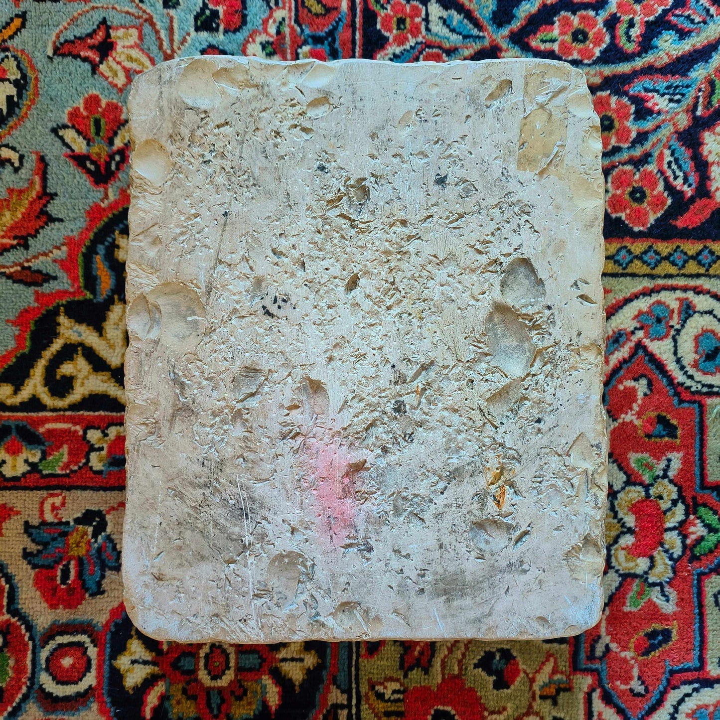 Lithographic limestone printing block featuring hand-drawn stone church tower with weather vane in rural landscape