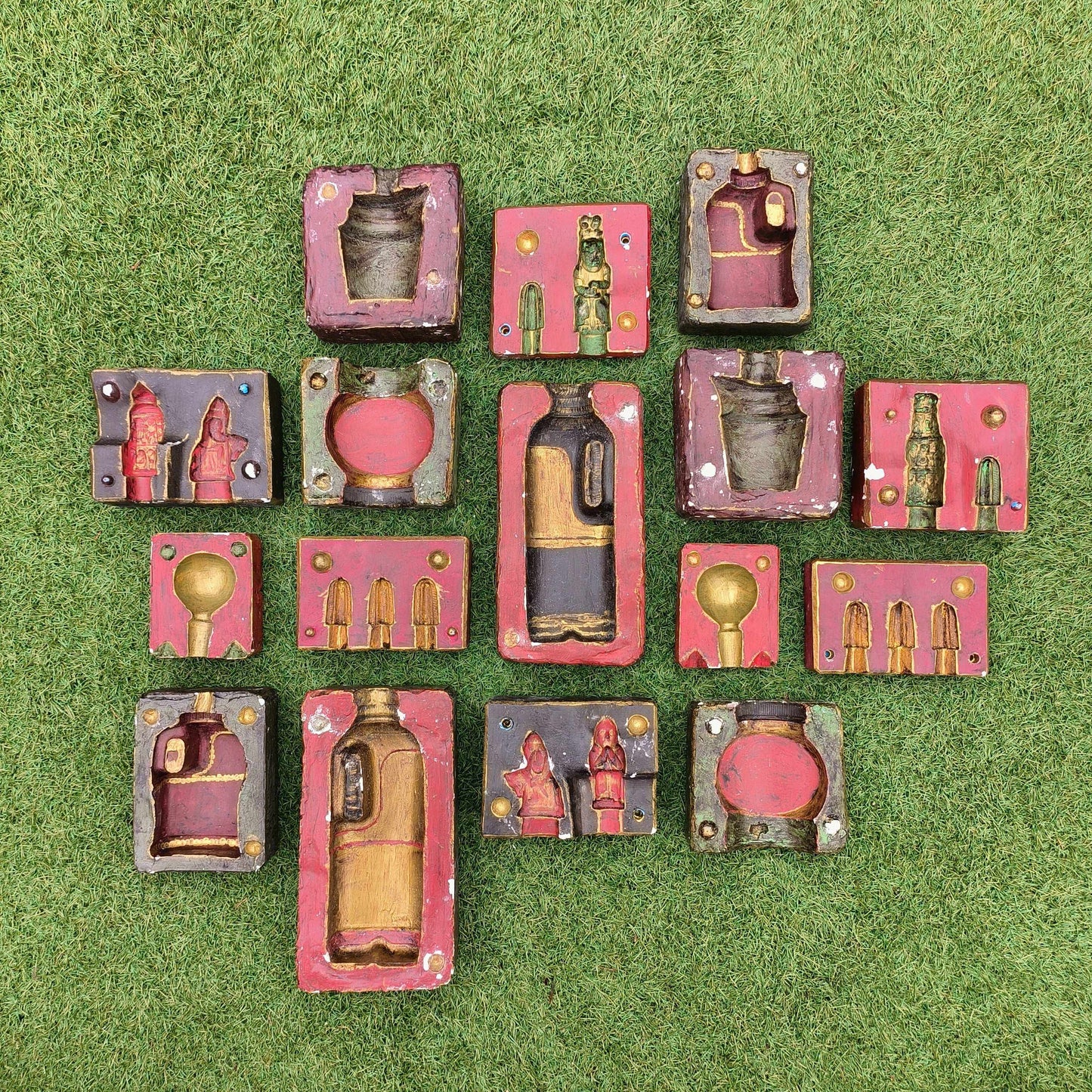 Various decorative plaster moulds from the Cotswolds including bottle and chess piece designs