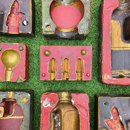 Various decorative plaster moulds from the Cotswolds including bottle and chess piece designs