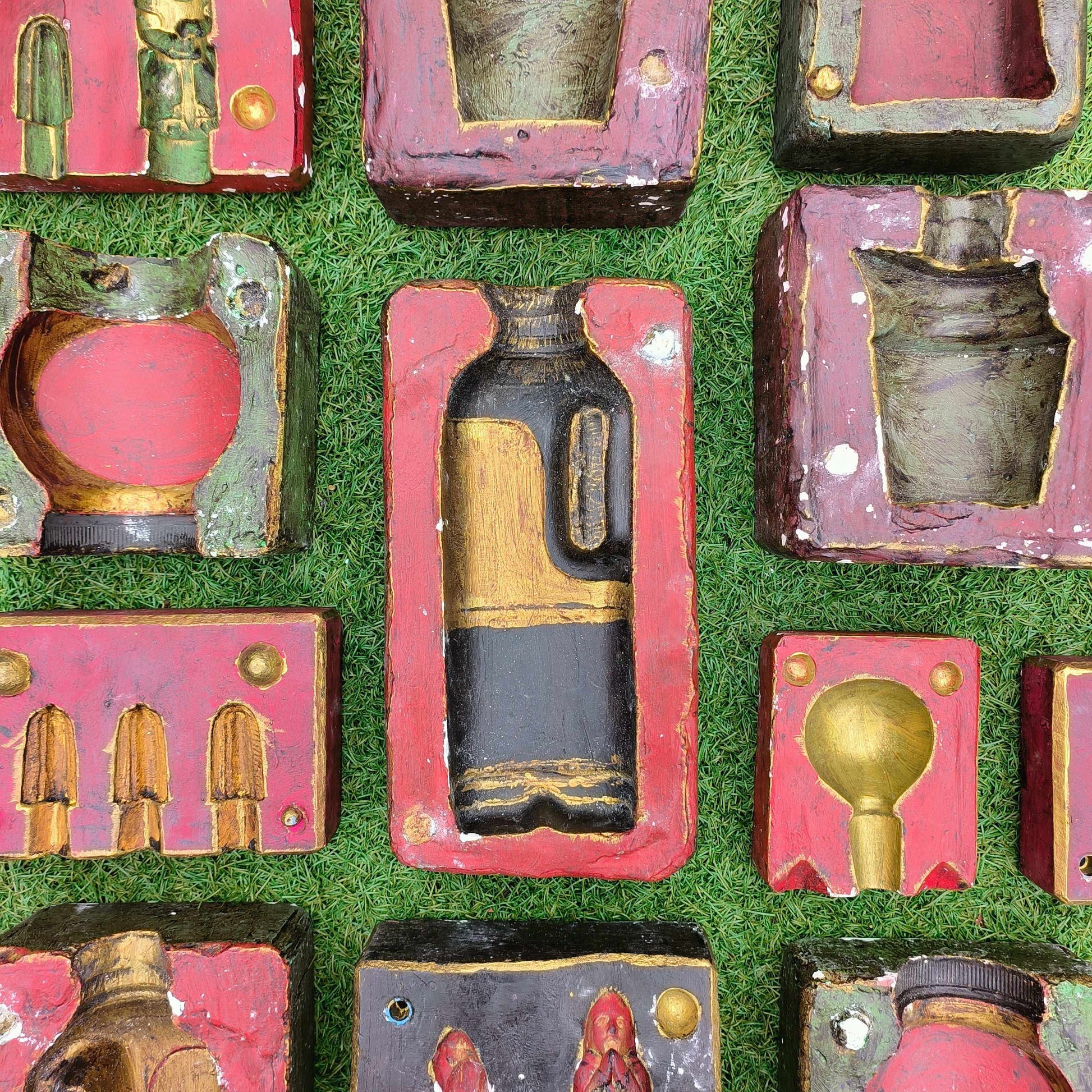 Various decorative plaster moulds from the Cotswolds including bottle and chess piece designs